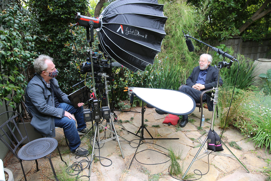  Filming interview by director Dan Raim with film critic Kenneth Turan. 